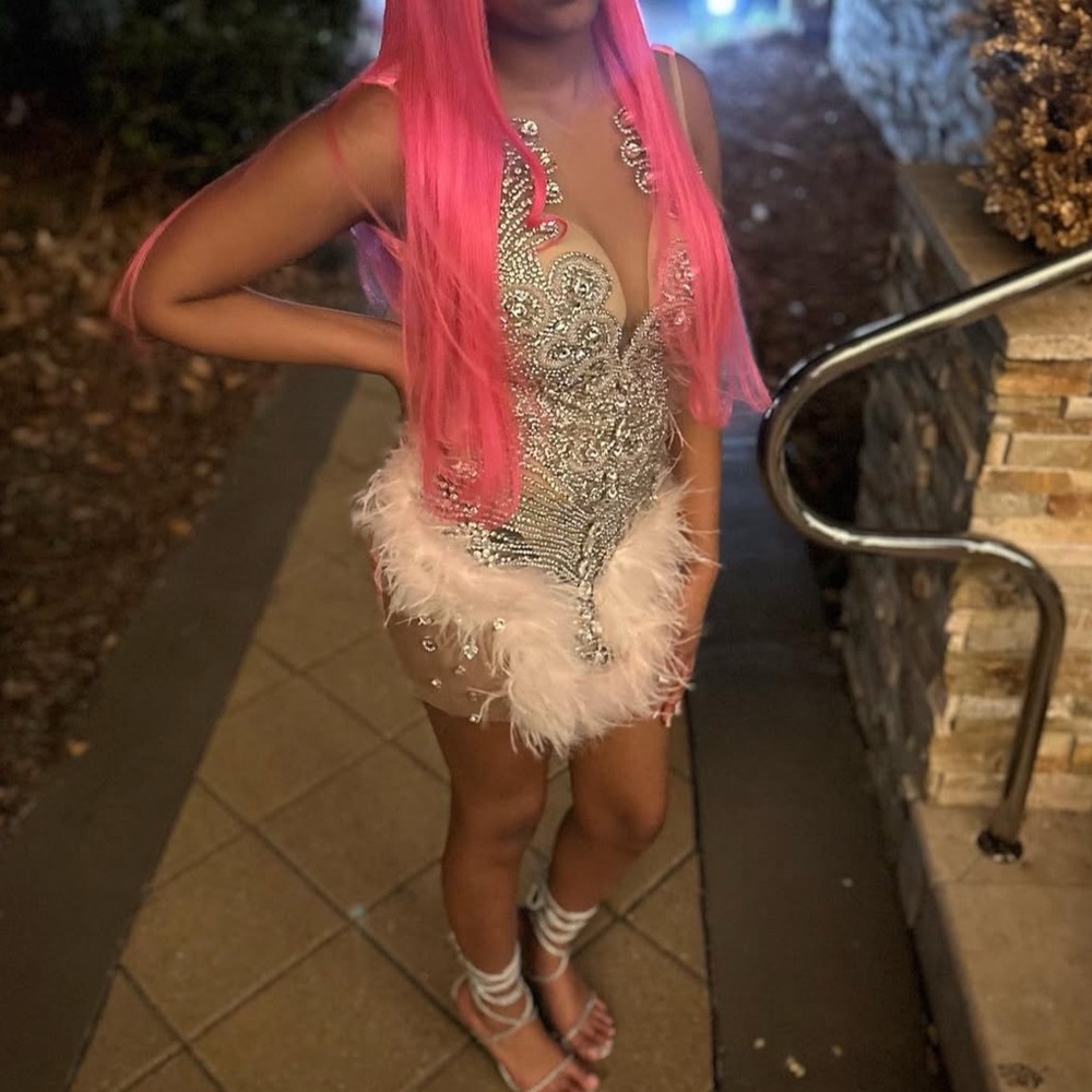 Elegant Silver Dress with Pink Feather Accents